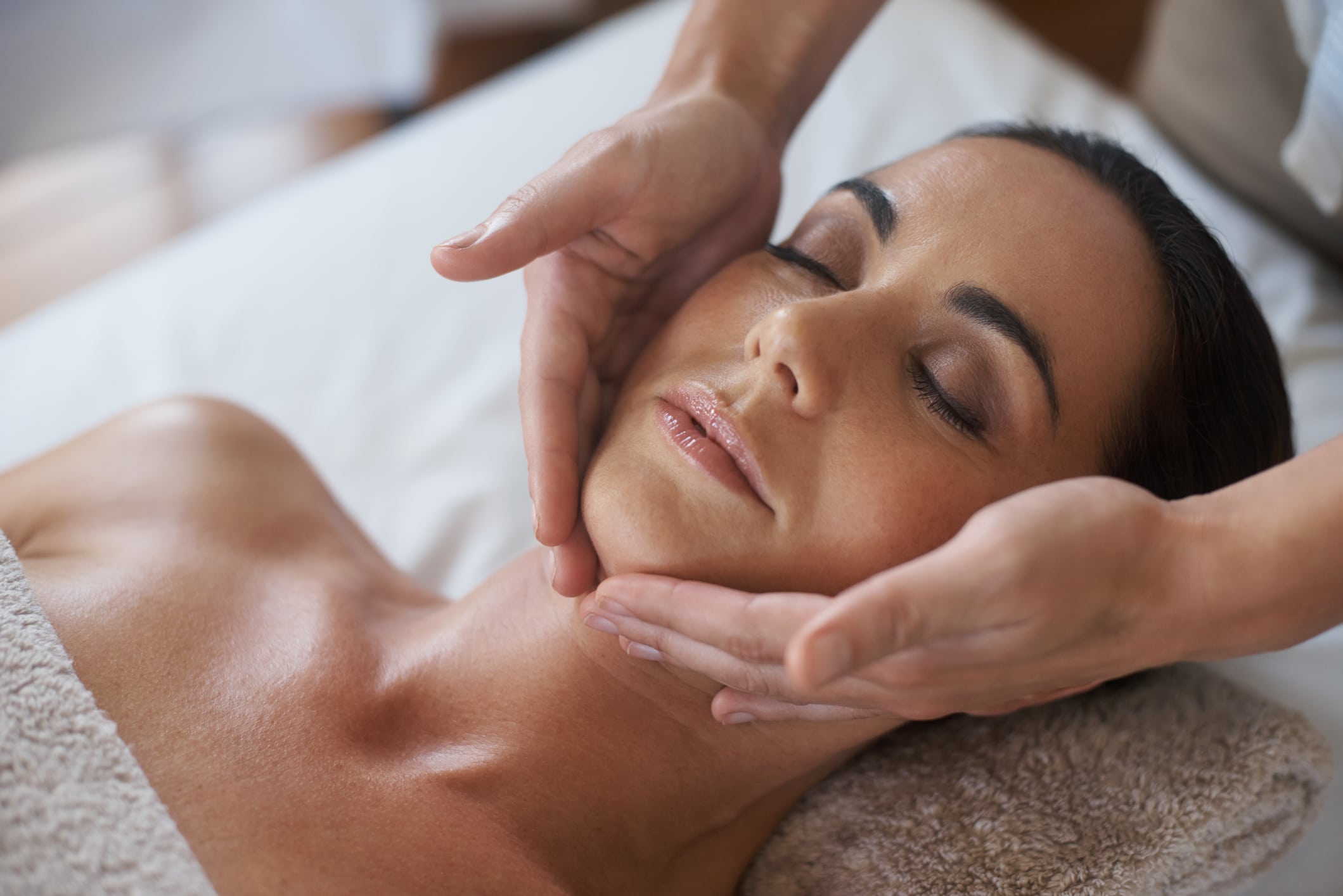 woman getting a facial woman getting a facial